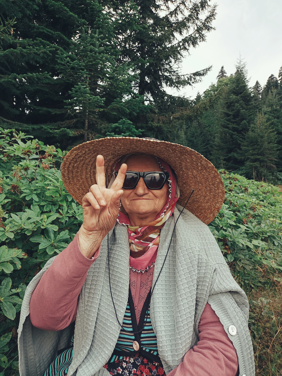 Cool Old Woman Showing Victory Gesture